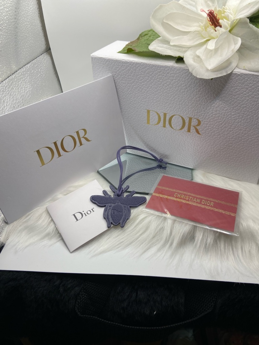 BINGO $25 DIOR WHITE PEBBLED BOX, 8.75” x 5.25” x 3”